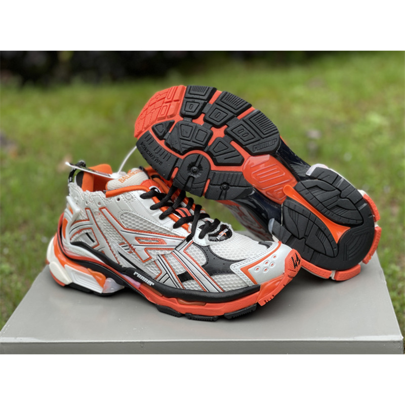 kith x Ba*len*cia*ga runner sneaker white/orange/black
