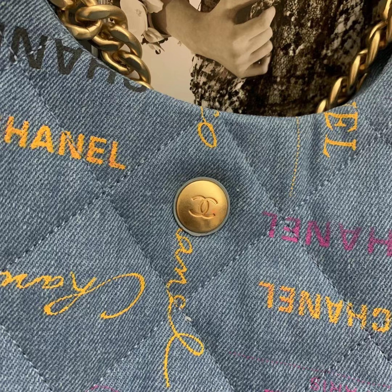 Ch*el  maxi hobo bag printed denim & gold-tone metal blue & multicolor