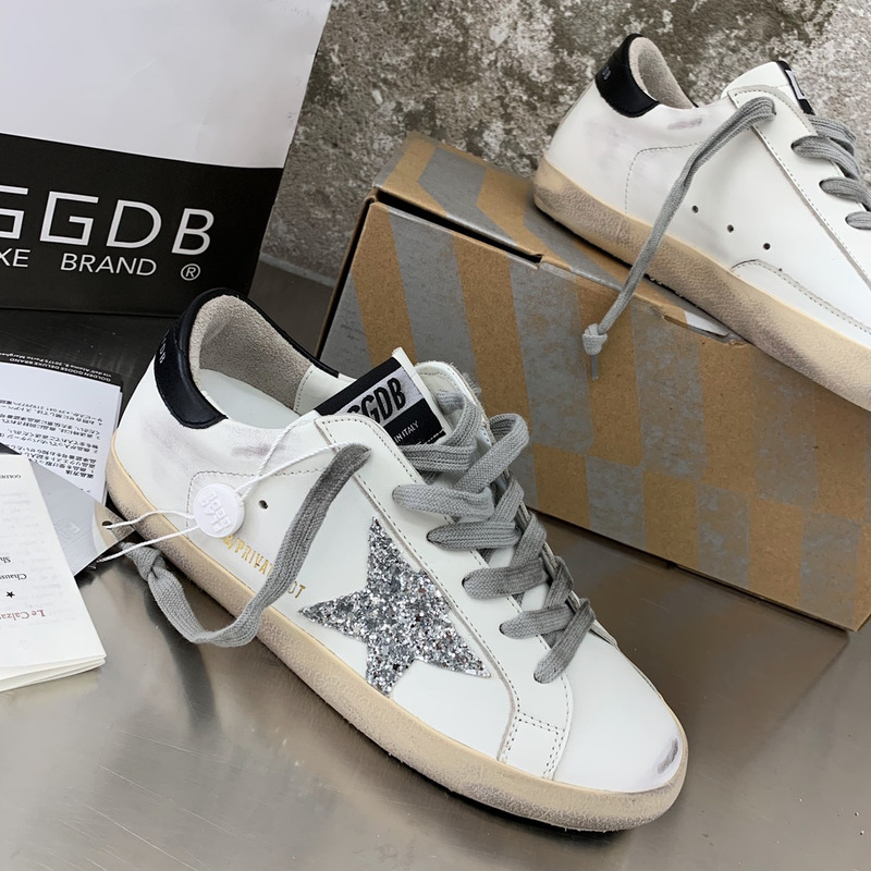 golden goose S*per-star sneakers with sliver glitter and black heel tab