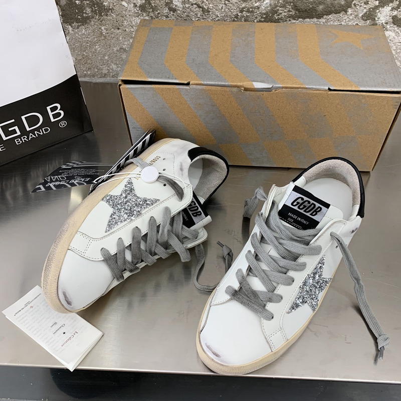 golden goose S*per-star sneakers with sliver glitter and black heel tab