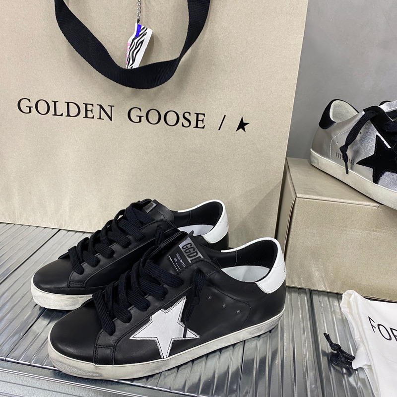 golden goose black S*per-star sneakers in leather with white star