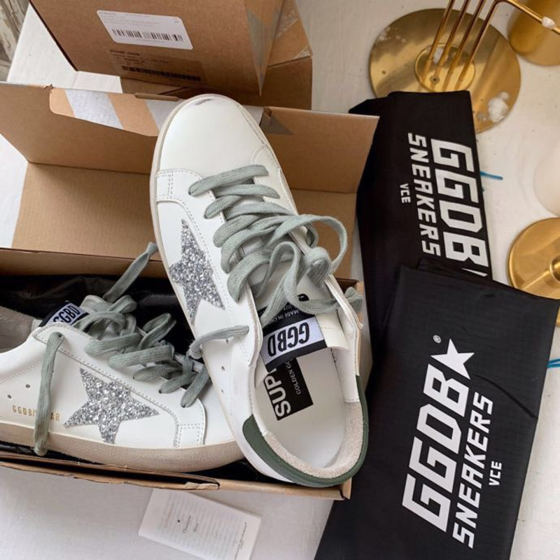 golden goose S*per-star sneakers with sliver glitter and black heel tab