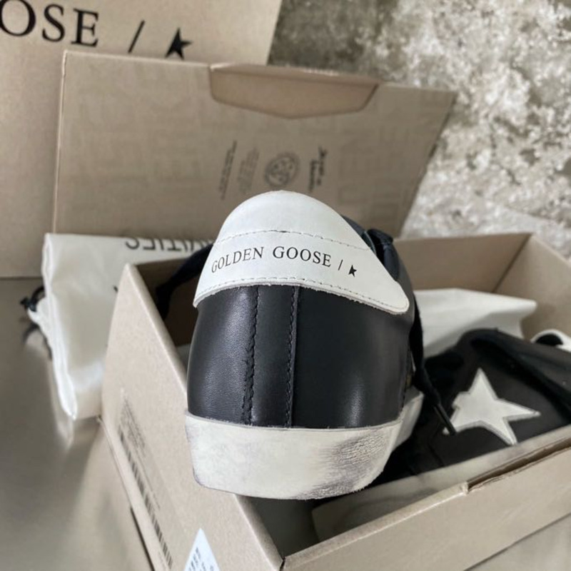 golden goose black S*per-star sneakers in leather with white star
