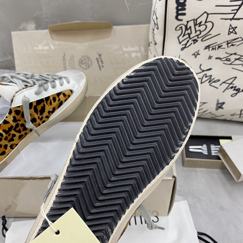 golden goose S*per-star sneakers with leopard print and black heel tab