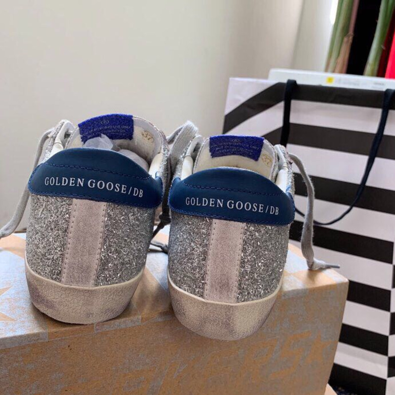 golden goose S*per-star sneakers with sliver glitter and blue heel tab