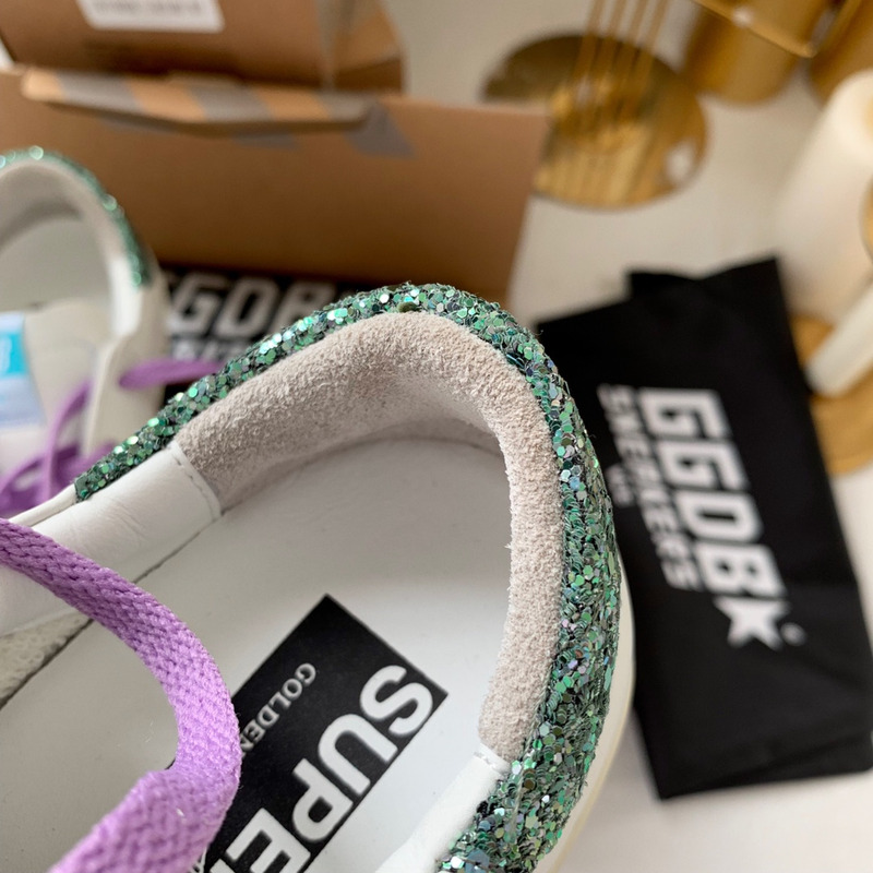 golden goose S*per-star sneakers with star and green glitter heel tab