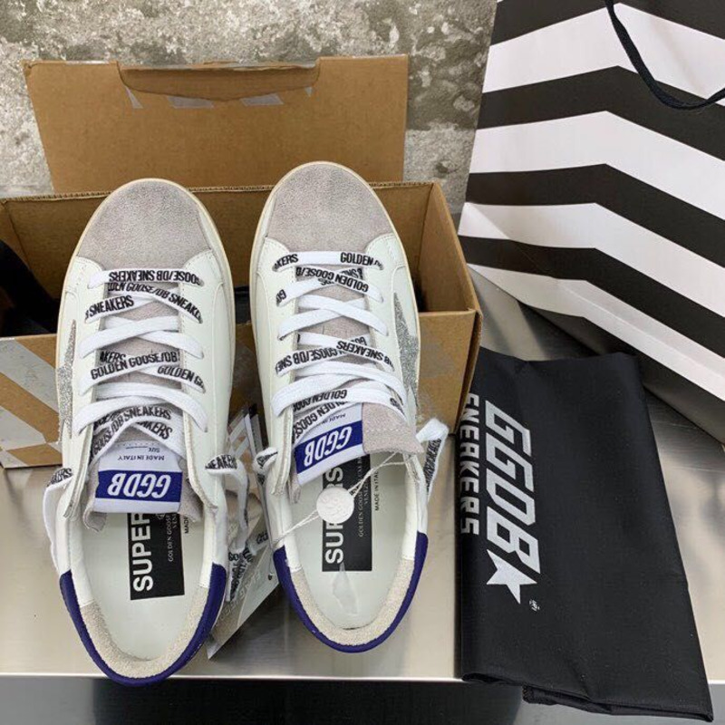 golden goose men’s S*per-star sneakers with sliver glitter star and blue heel tab