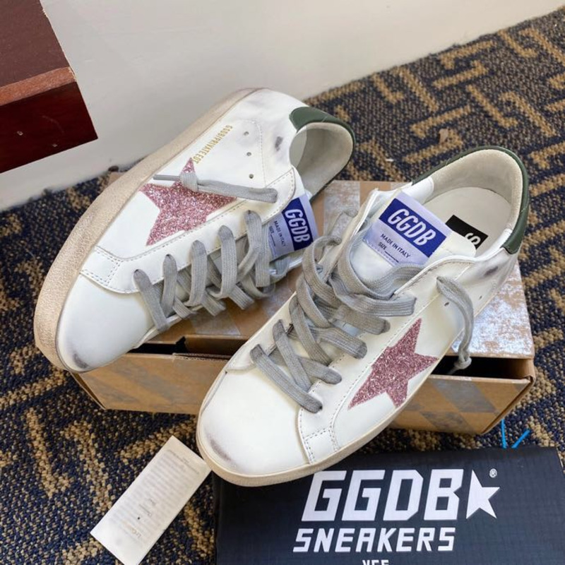 golden goose men’s S*per-star sneakers with pink glitter star and green heel tab