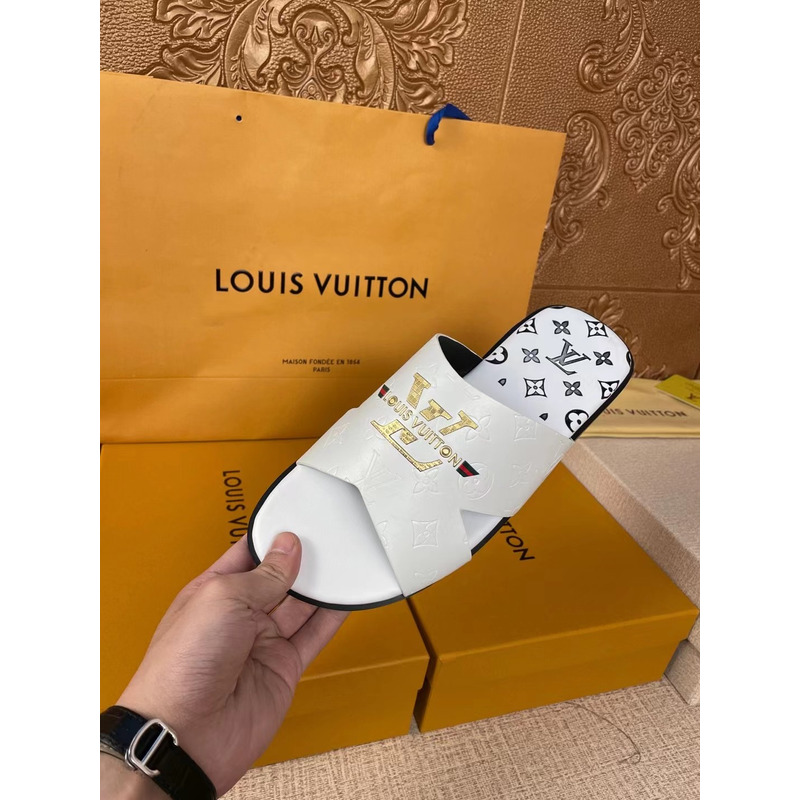 l**is V*t*n gold logo mules white