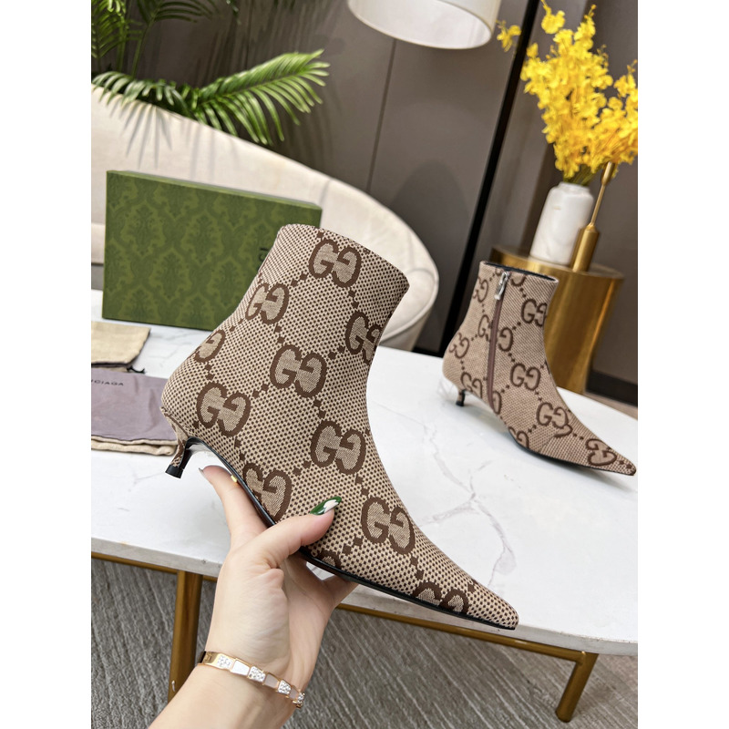 g*u*i x Ba*len*cia*ga collaboration ankle boots in brown