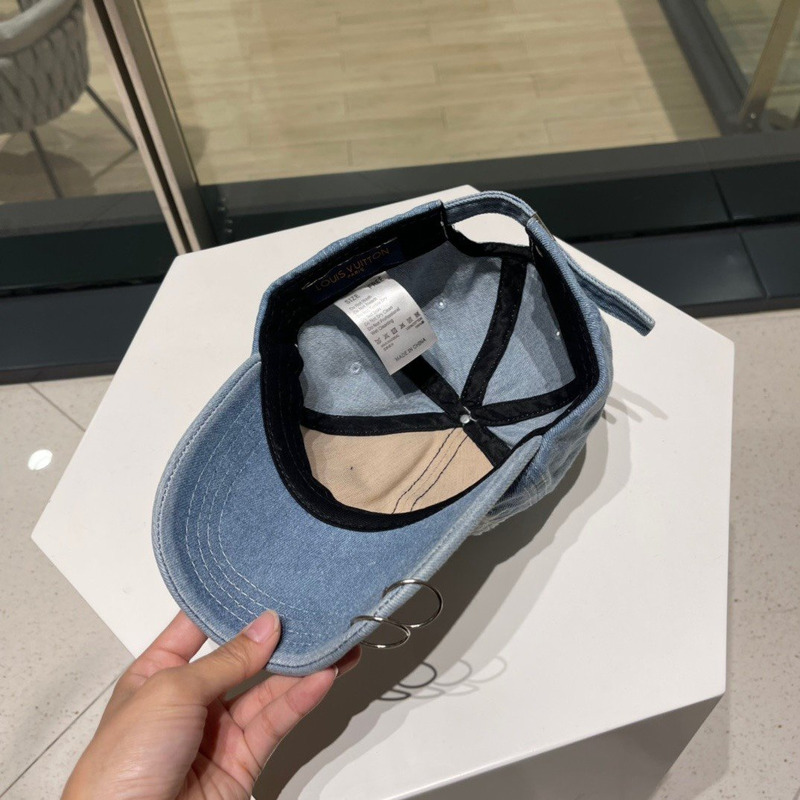 l**is V*t*n metal logo ripped hat blue denim