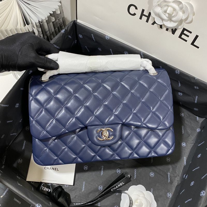 Ch*el  21s Ch*el blue classic flap medium cf25 dark blue