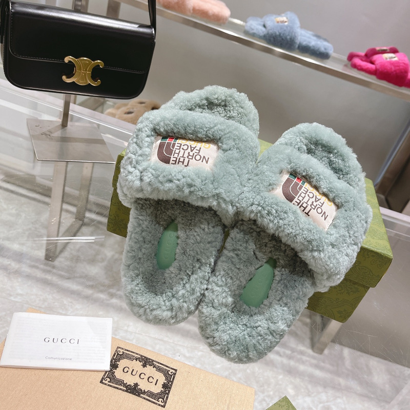 g*u*i x the n0*h F**e shearling slides green
