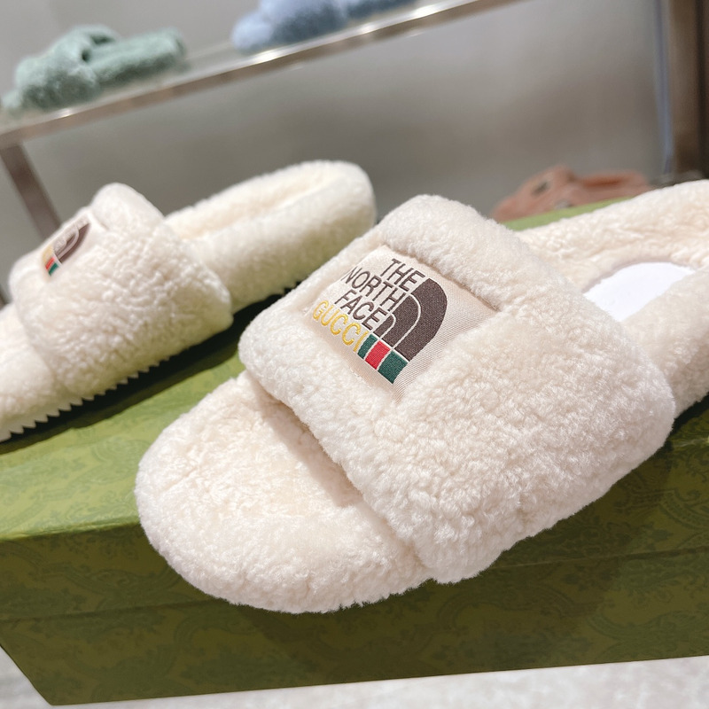 g*u*i x the n0*h F**e shearling slides white