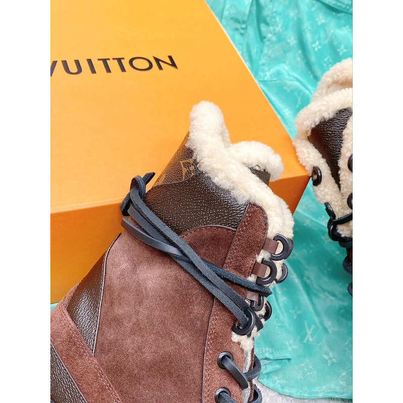 l**is V*t*n laureate monogram platform boots brown