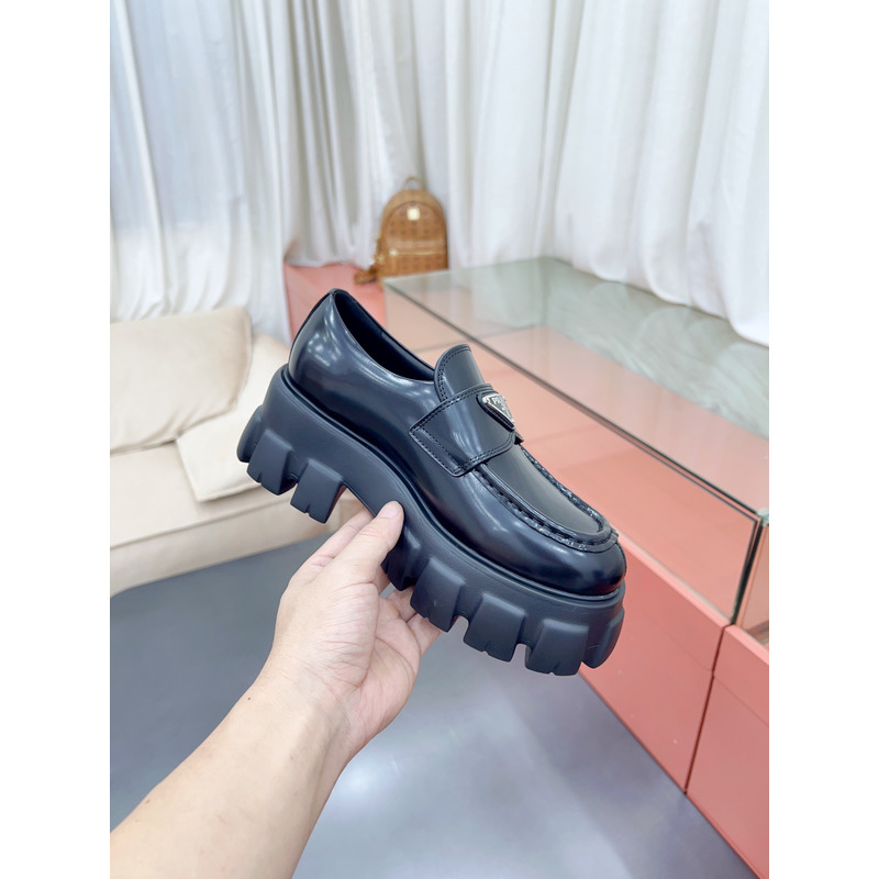 Pra*a monolith polished leather slip-ons black
