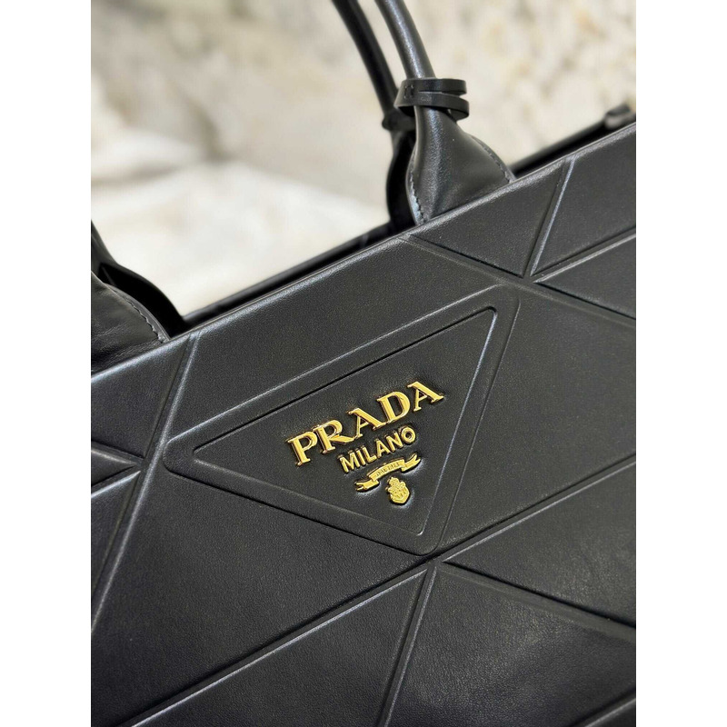 Pra*a medium leather handbag with topstitching black