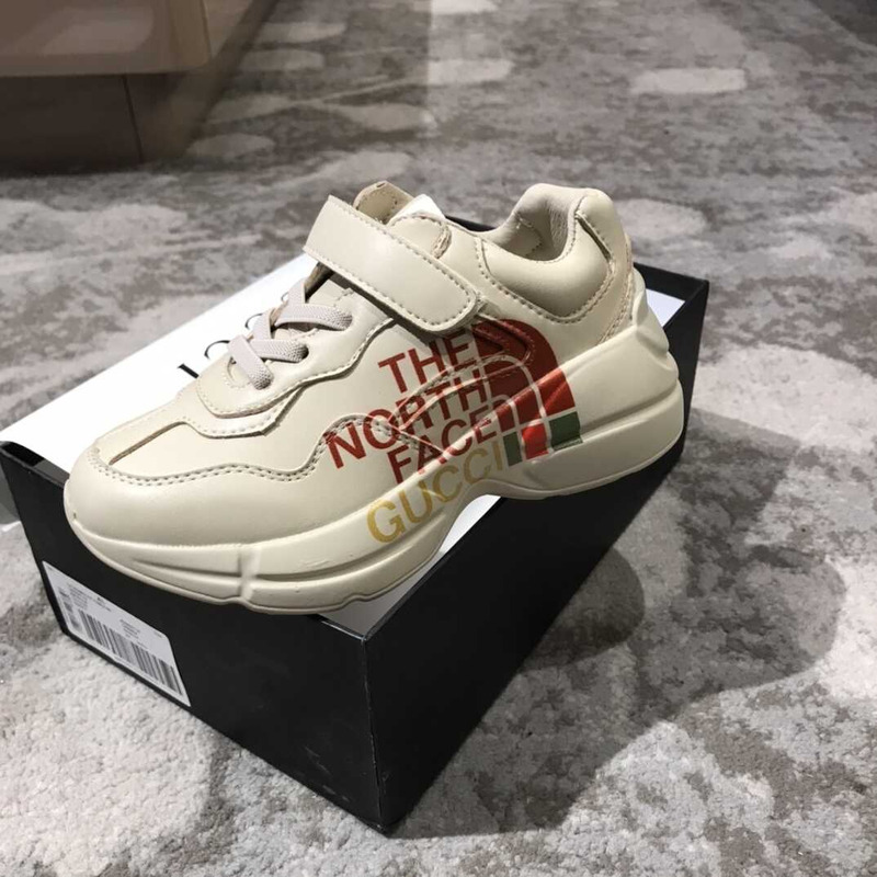 g*u*i x the n0*h F**e kids sneakers