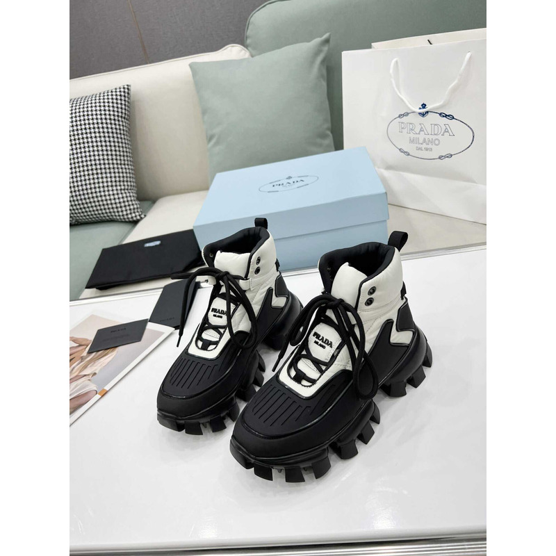 Pra*a cloudbust thunder high top sneakers black and white