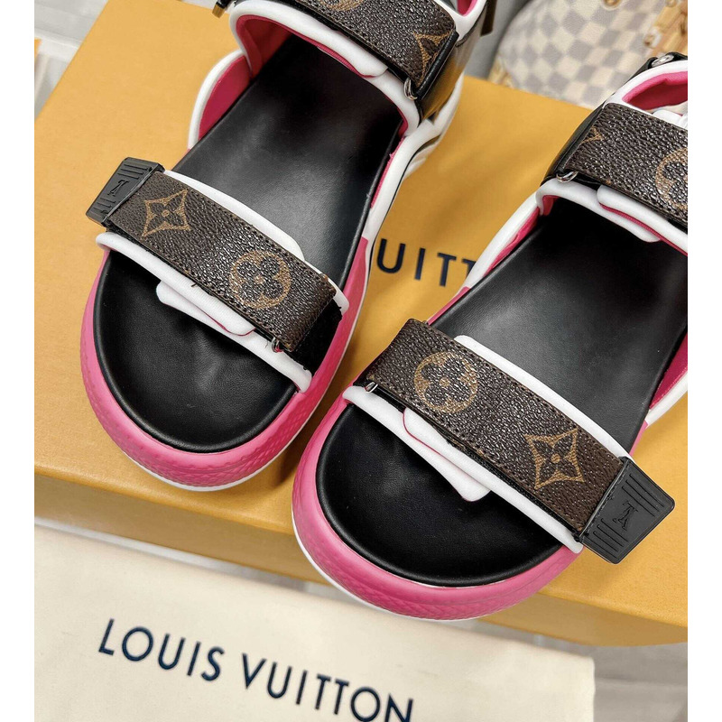 l**is V*t*n archlight sandal black and pink