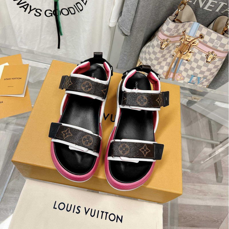 l**is V*t*n archlight sandal black and pink