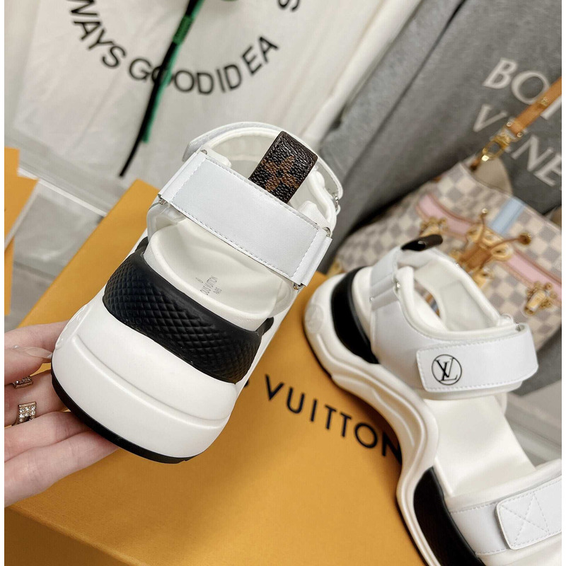 l**is V*t*n archlight sandal black and white
