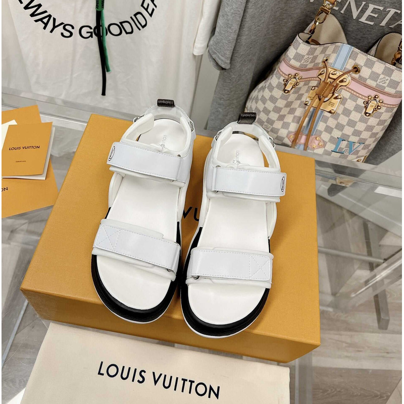 l**is V*t*n archlight sandal black and white
