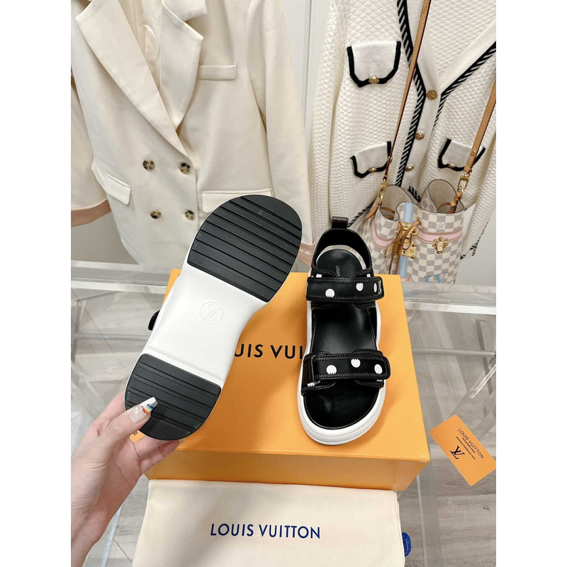 l**is V*t*n archlight sandal black and white