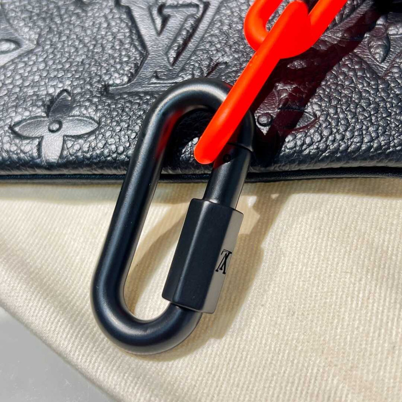 l**is V*t*n pochette cles monogram orange black