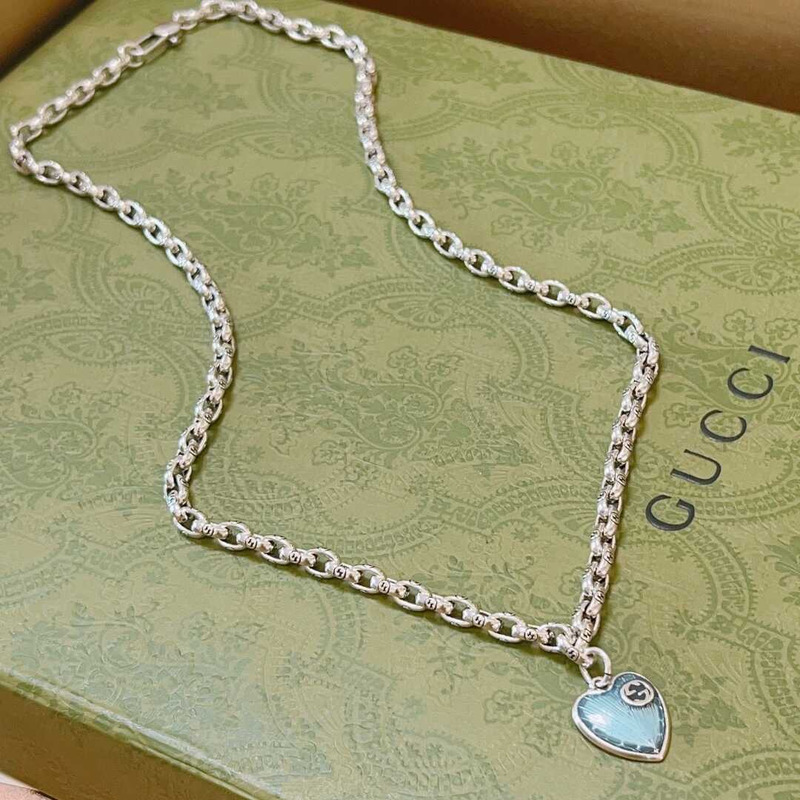 G*u*i blue heart necklace