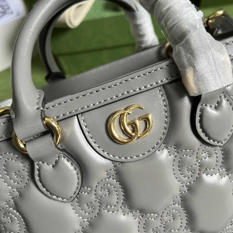 G*u*i gg quilted mini handle bag grey