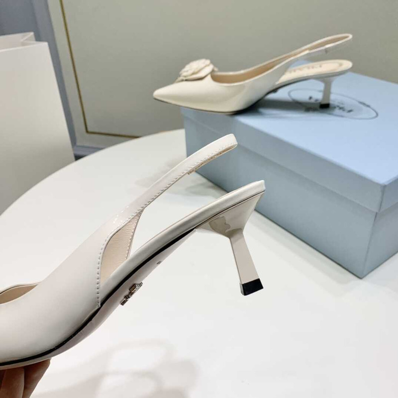 Pra*a white patent leather slingback