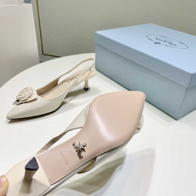 Pra*a white patent leather slingback