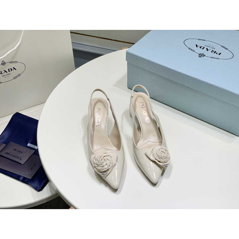 Pra*a white patent leather slingback