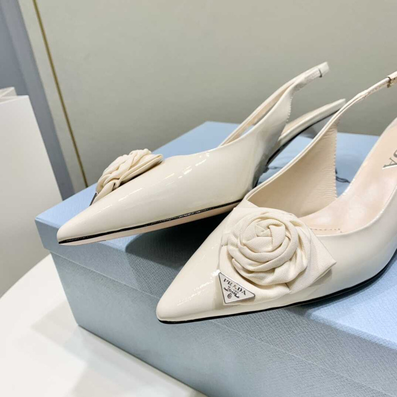 Pra*a white patent leather slingback