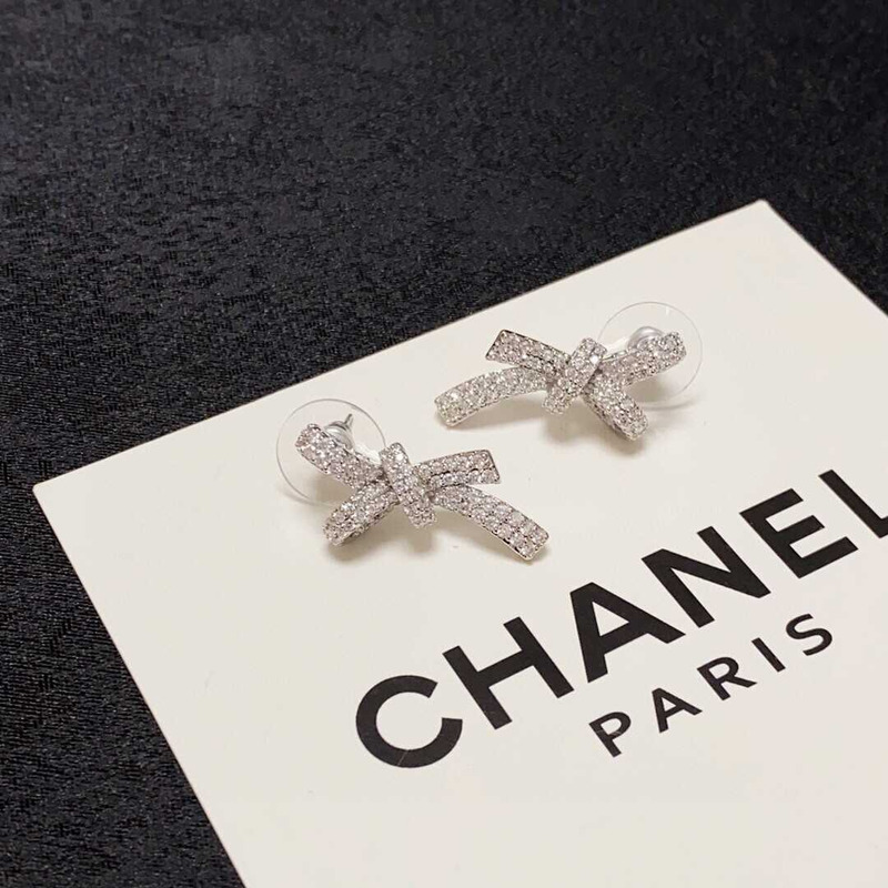 ch*el bow tie sparkling Di*m*nd earrings