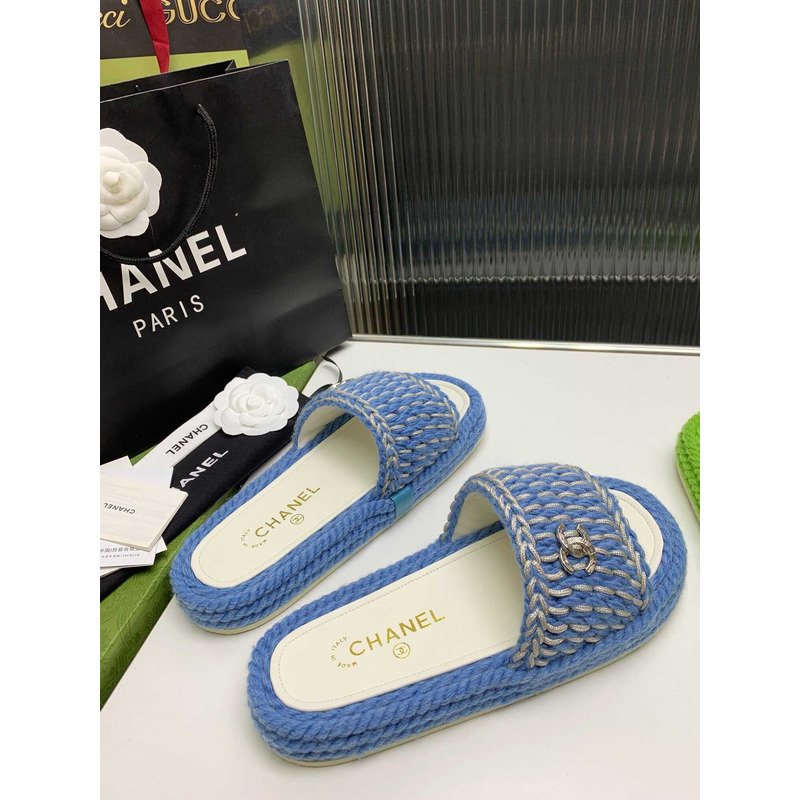 Ch*el braided knit metallic cc slides light blue