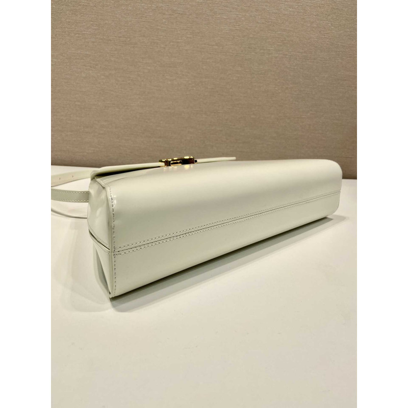 Pra*a medium brushed leather handbag white
