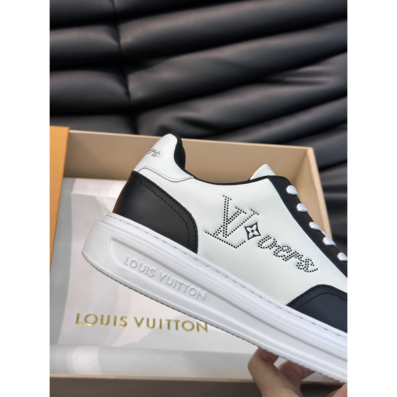 l**is V*t*n sneaker low black and white