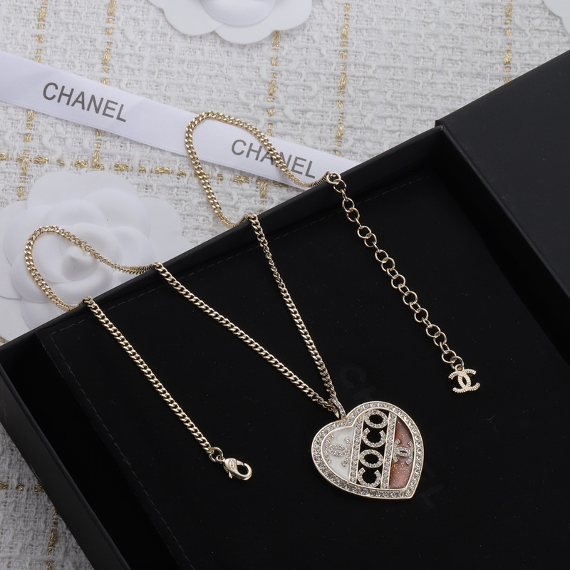 Ch*el pendant metal and crystal necklace