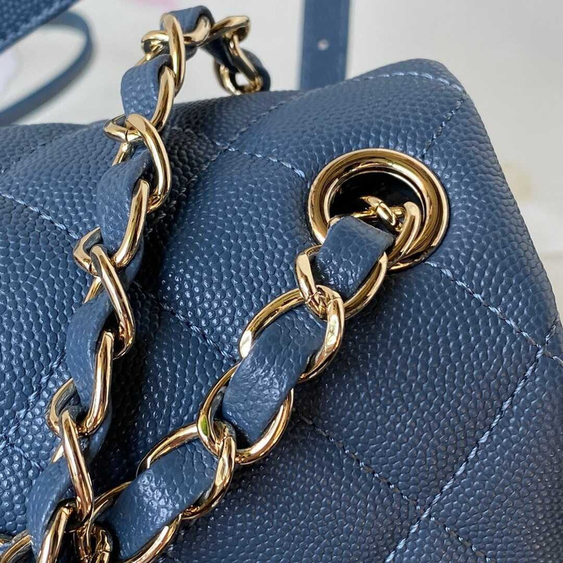 Ch*el small backpack grained shiny calfskin & gold-tone metal blue
