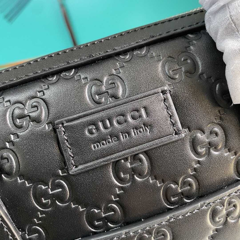 g*u*i gg S*p*e embossed leather briefcase black
