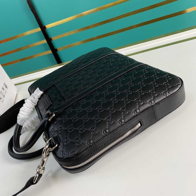 g*u*i gg S*p*e embossed leather briefcase black