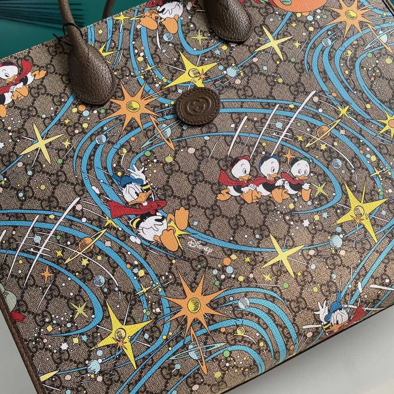 G*u*i x disney limited tote beige