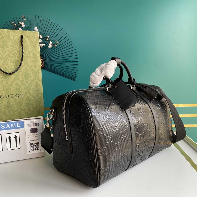 G*u*i gg embossed duffle bag black