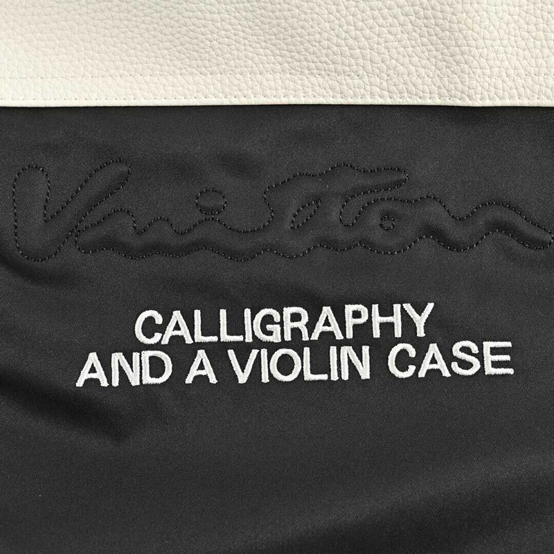 l**is V*t*n leather and nylon blouson jacket black and white