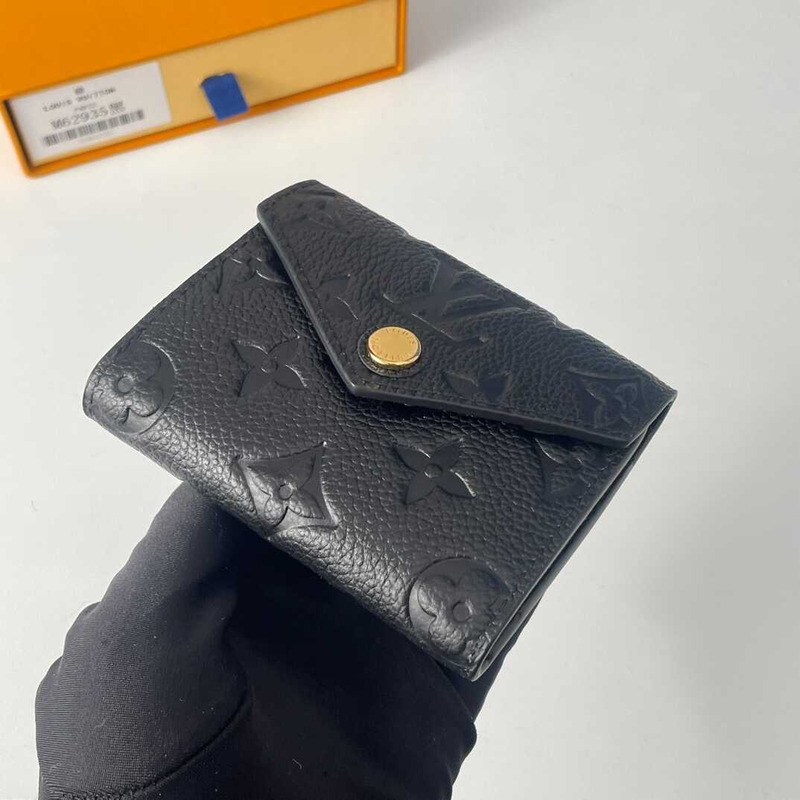 l**is V*t*n zoé wallet monogram empreinte leather black