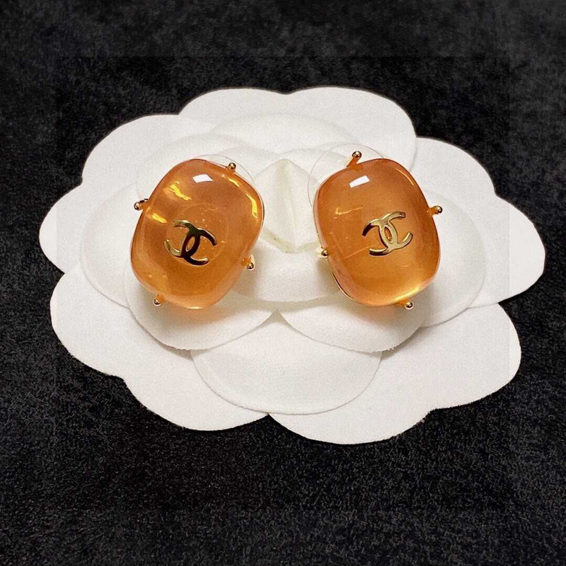 Ch*el cc logo earrings orange tone