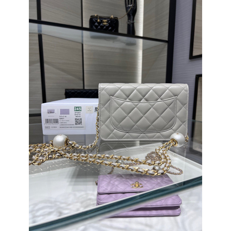 Ch*el lambskin, imitation pearls & gold metal in white