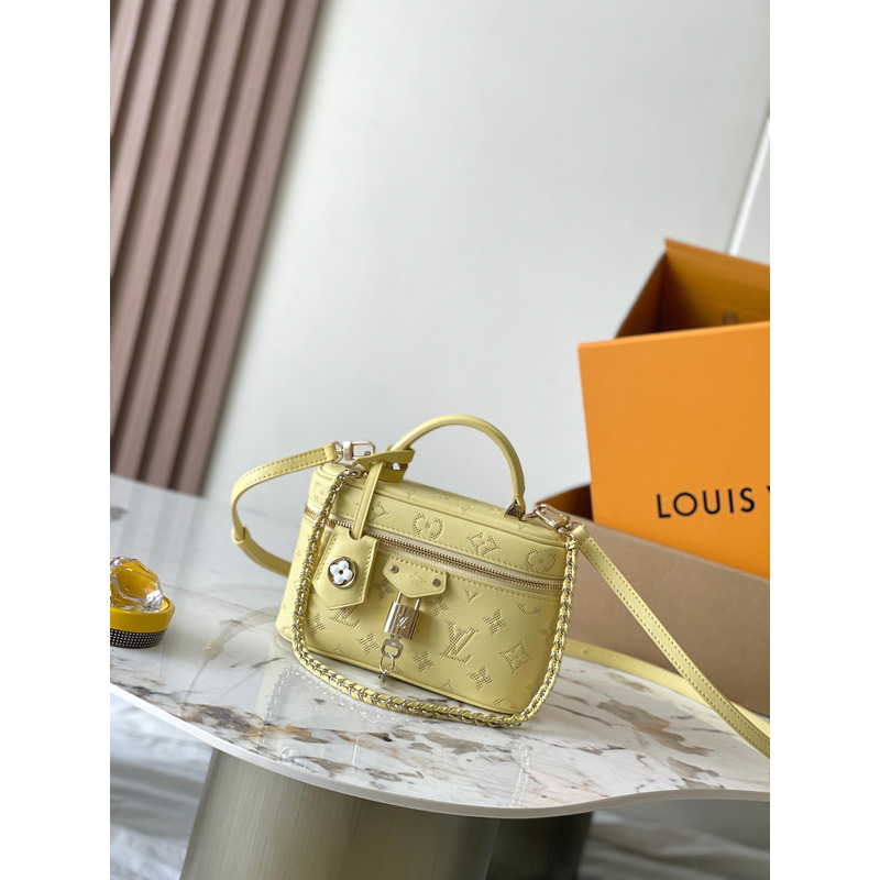 l**is V*t*n vanity chain pouch in yellow